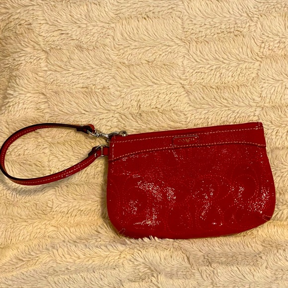 Coach Handbags - Patent leather red COACH wristlet
